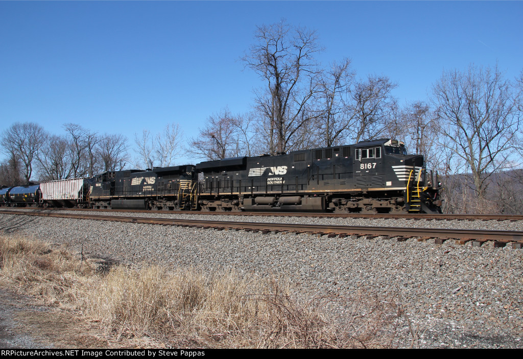 NS 8167 takes a unit oil train east